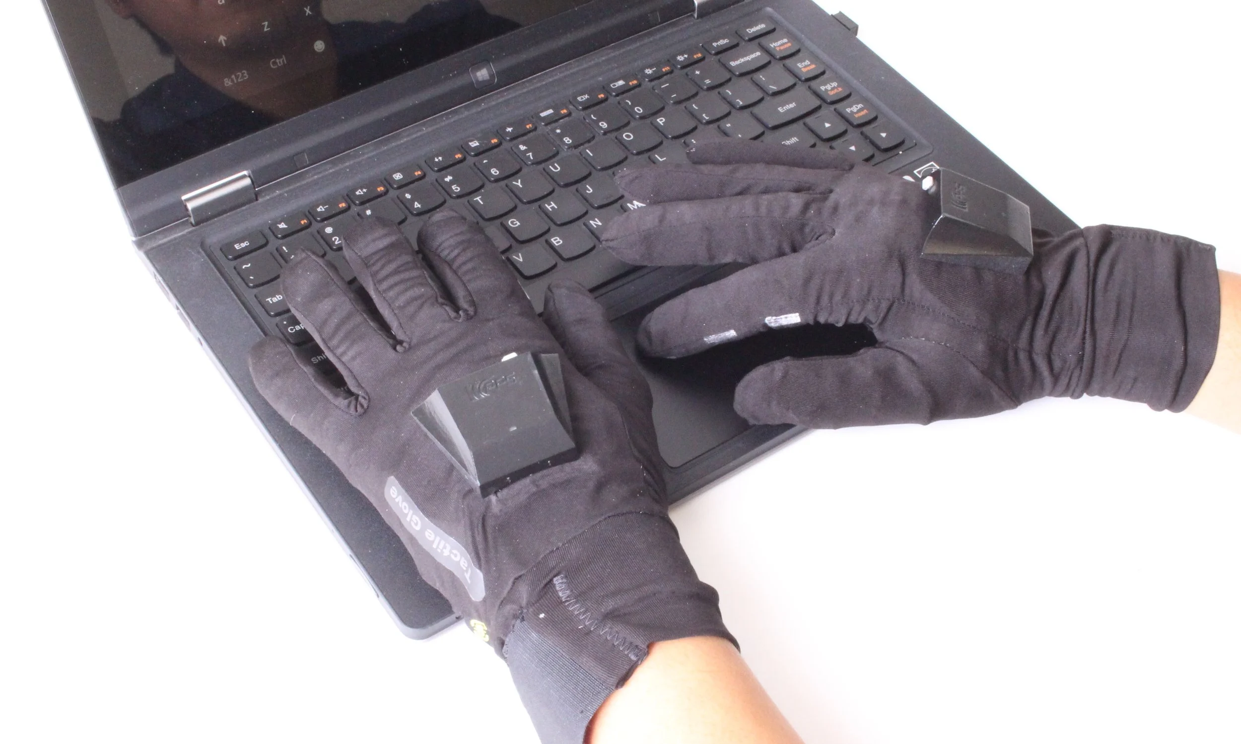 Typing on computer keyboard with Tactile Gloves