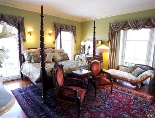 The Isaac Kendall Room offers a luxurious king-size bed, a shower, and glorious views of the harbor.