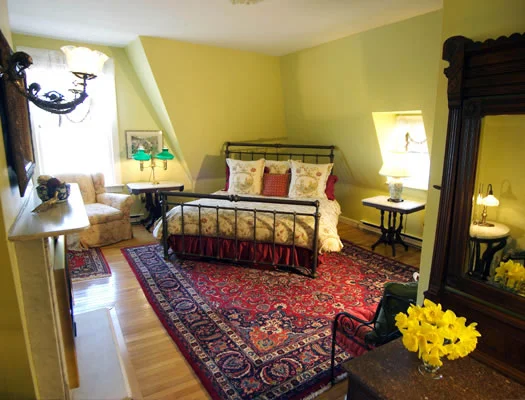 The Tower Suite on the third floor has it all - a sitting room, a view of the harbor, a king-size bed, walk-in shower, and more!