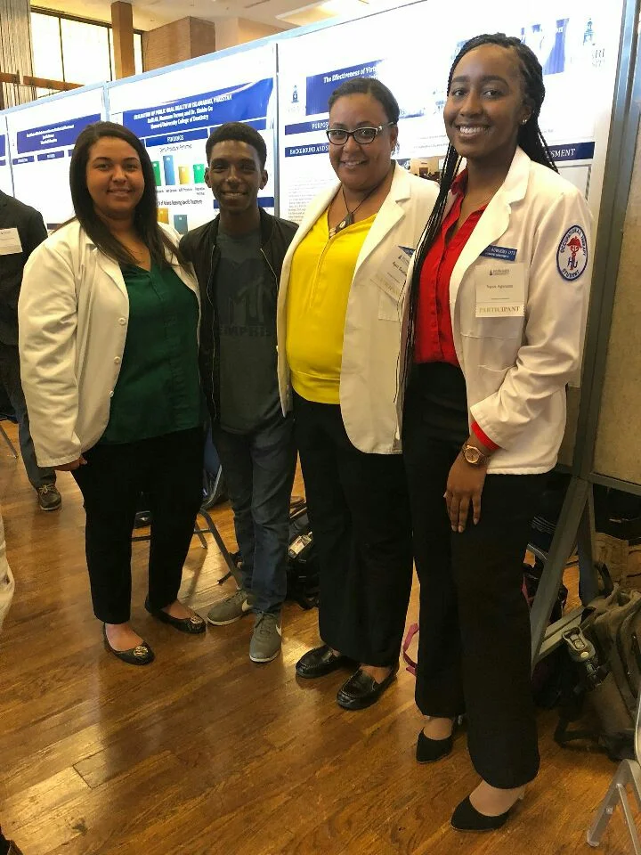 PresentingatResearchWeekHUASBSpring2018 copy.jpg