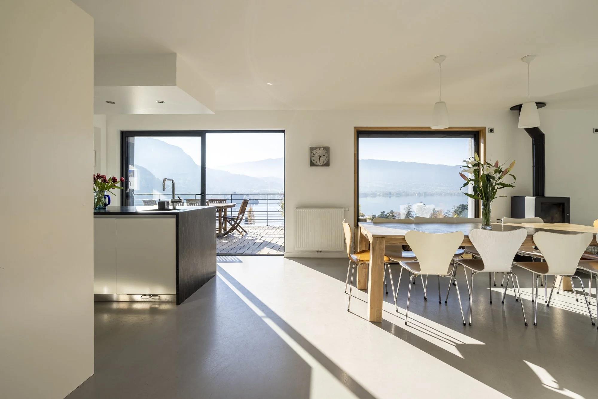 Talloires Lakehouse Villa Lounge and dining open space with lake views.jpg