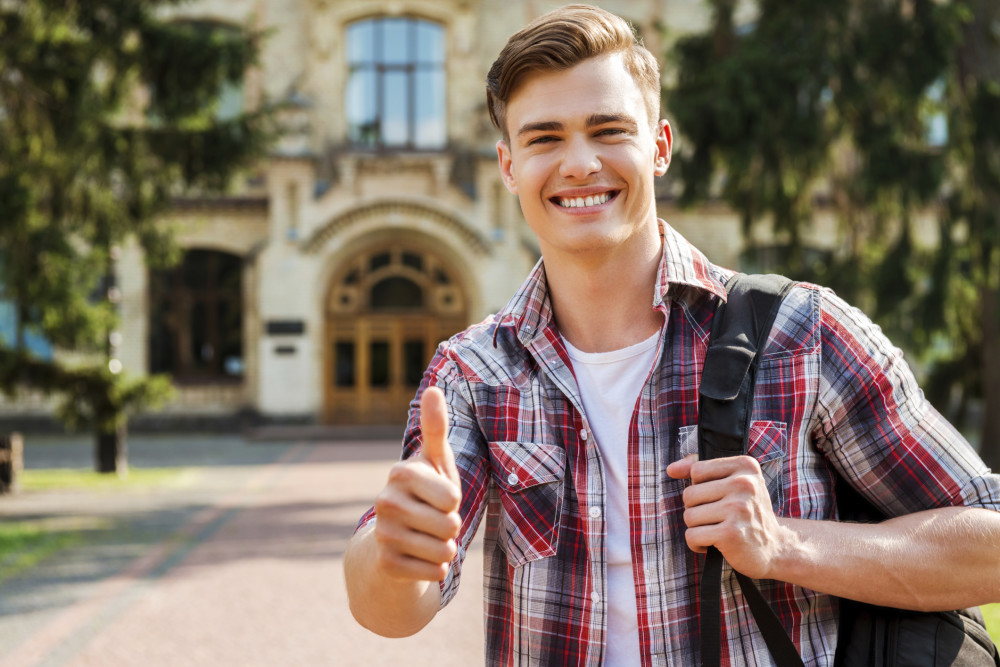 College-Student-Thumbs-Up-e1440734712137.jpg