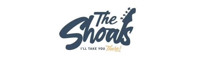 A navy and gold logo that reads "The Shoals, I'll take you there"