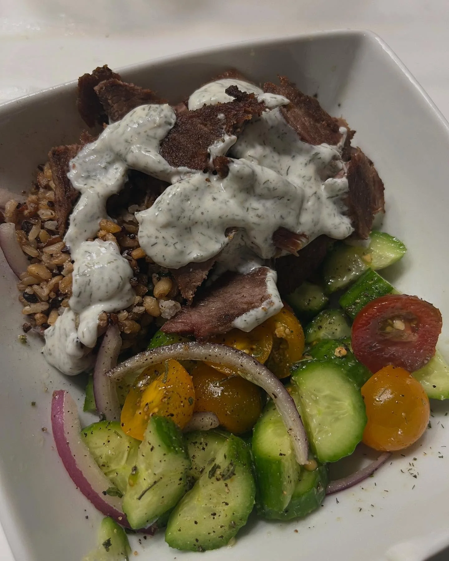 Made a lil horiatiki salad with some rice, leftover Easter lamb, and made a lil yogurt dill sauce 😋