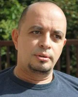 Juan-Antonio_Author-Photo_by-Anne-Provoost_1.22.2013_for-Web-e1366659428429.jpg