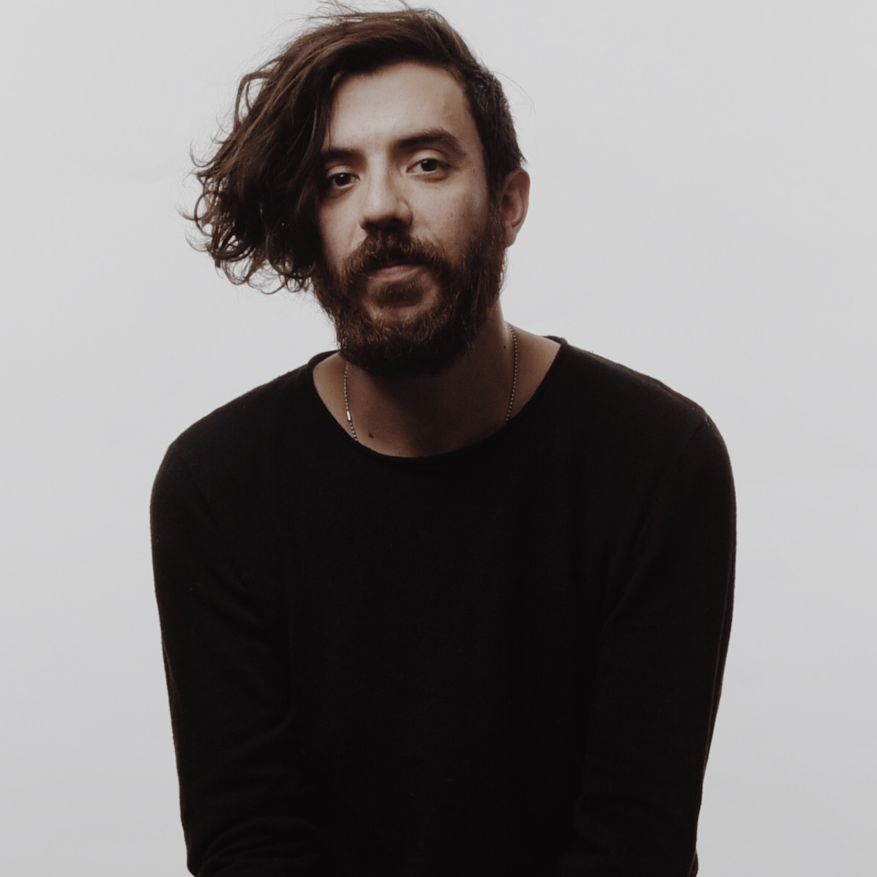 Kaveh Akbar's Calling a Wolf a Wolf Receives John C. Zacharis First Book Award