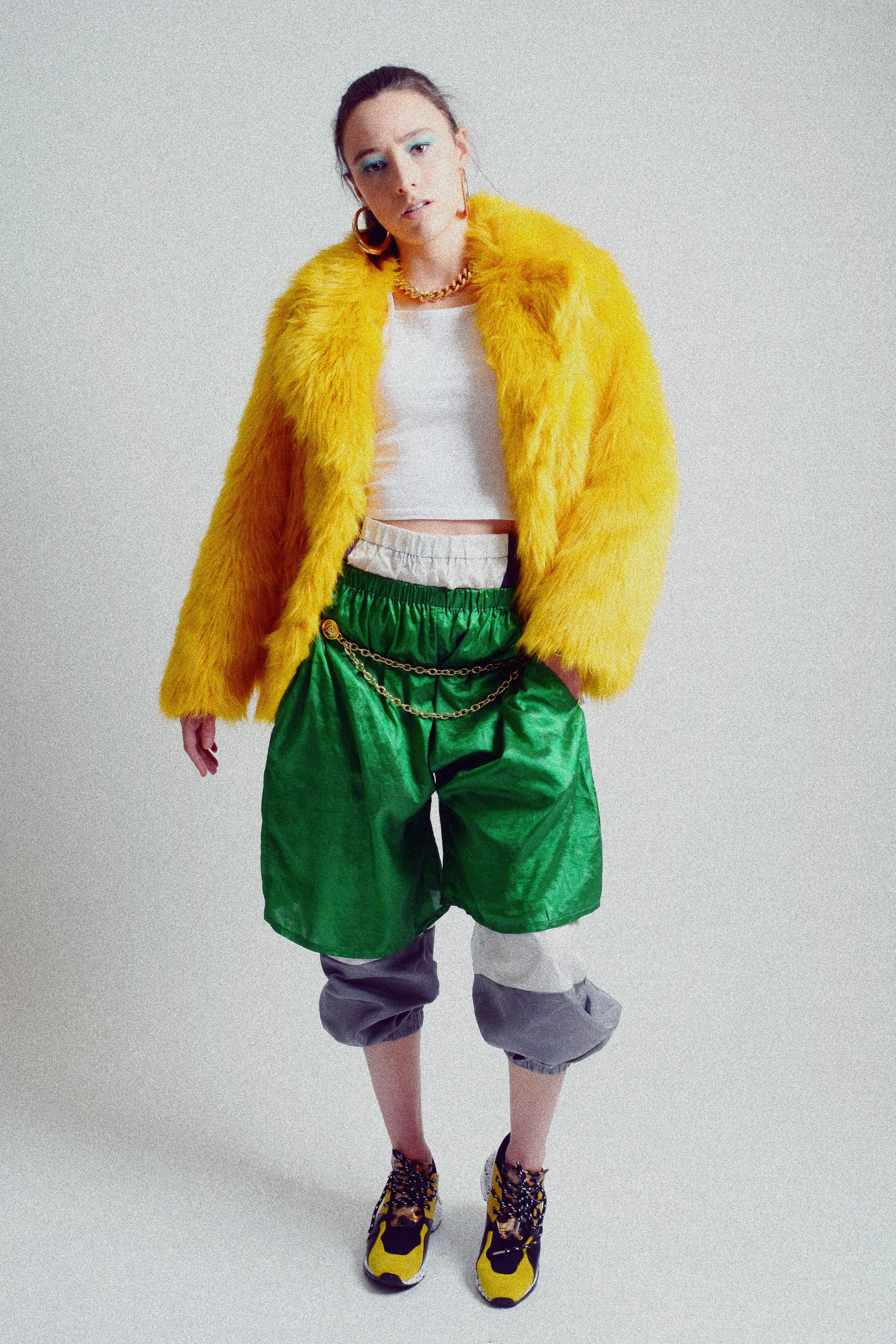 Jacket: TopShop Tank top: H&M Pants: Fashionnova Shorts: Alex S. Yu Shoes: Steve Madden Chain Belt: TopShop Necklace: H&M Earrings and bracelet: Aldo