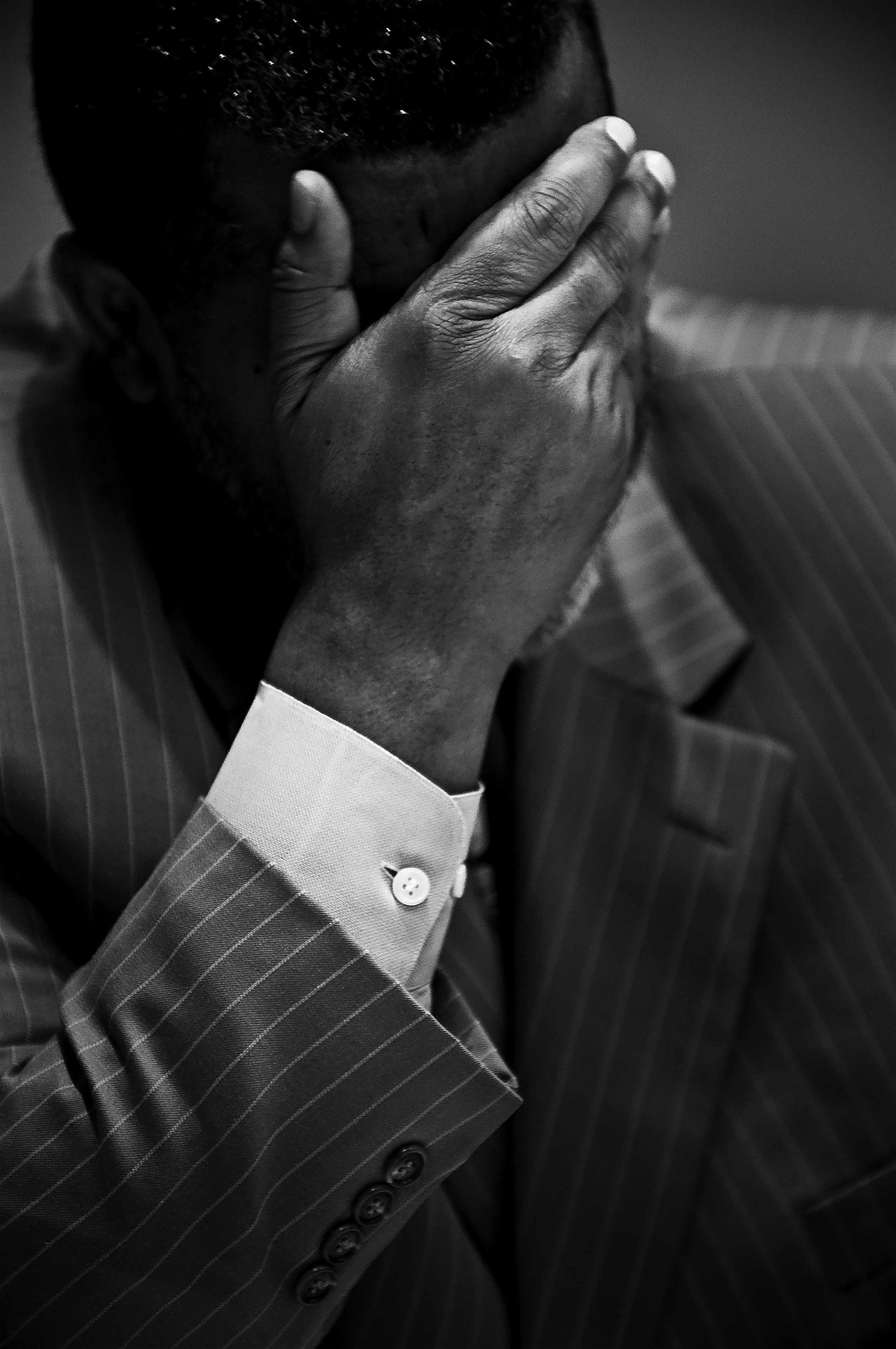  Former Dallas City Council member and Mayor Pro Tem Don Hill covers his face during an exclusive post-trial interview in Dallas, TX.  In 2009, Hill was sentenced to 18 years in federal prison for bribery, having been found guilty of coercing develop