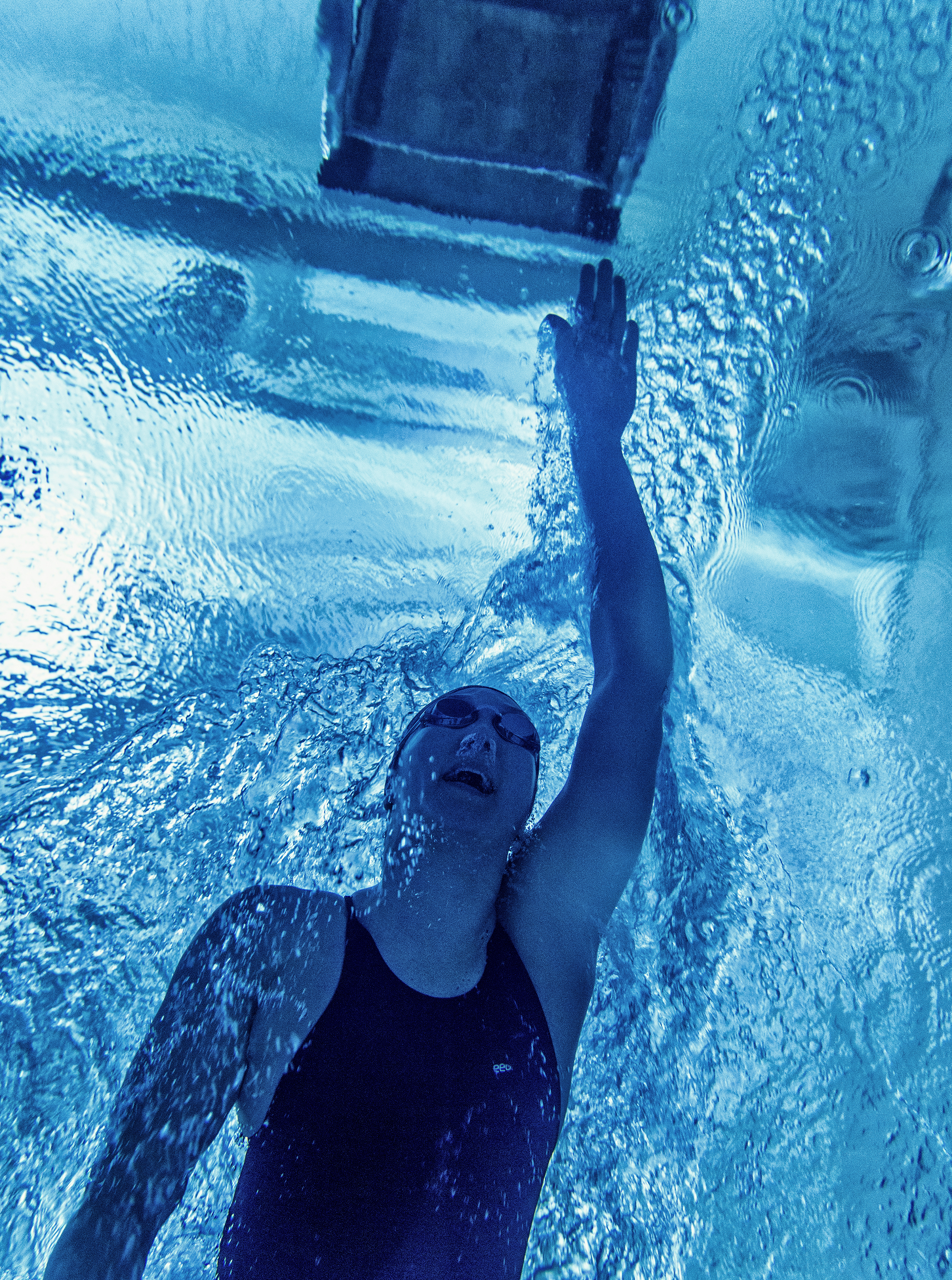  Michelle Chow swims at the Tom Landry Fitness Center in Dallas, TX.  Chow’s family immigrated from China during WWII and emphasized physical fitness to their children, nudging Chow toward competitive swimming.  When Chow showed an aptitude for the s