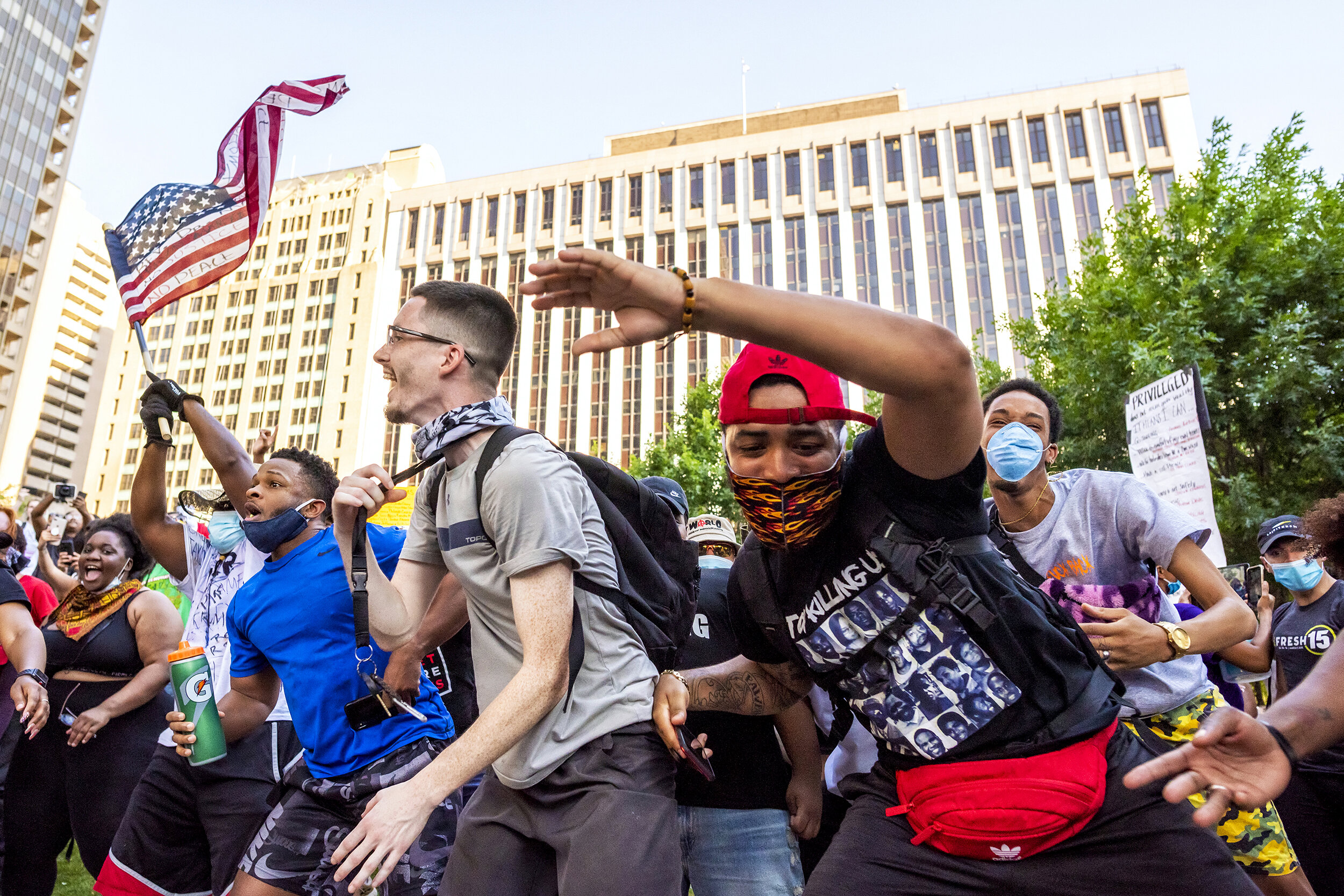  Protesters dance at Belo Garden after marching through downtown Dallas, TX on June 6, 2020.   While protests organically surged after the death of George Floyd, they soon sprung into organized affairs, to include medical tents and, in this case, a D