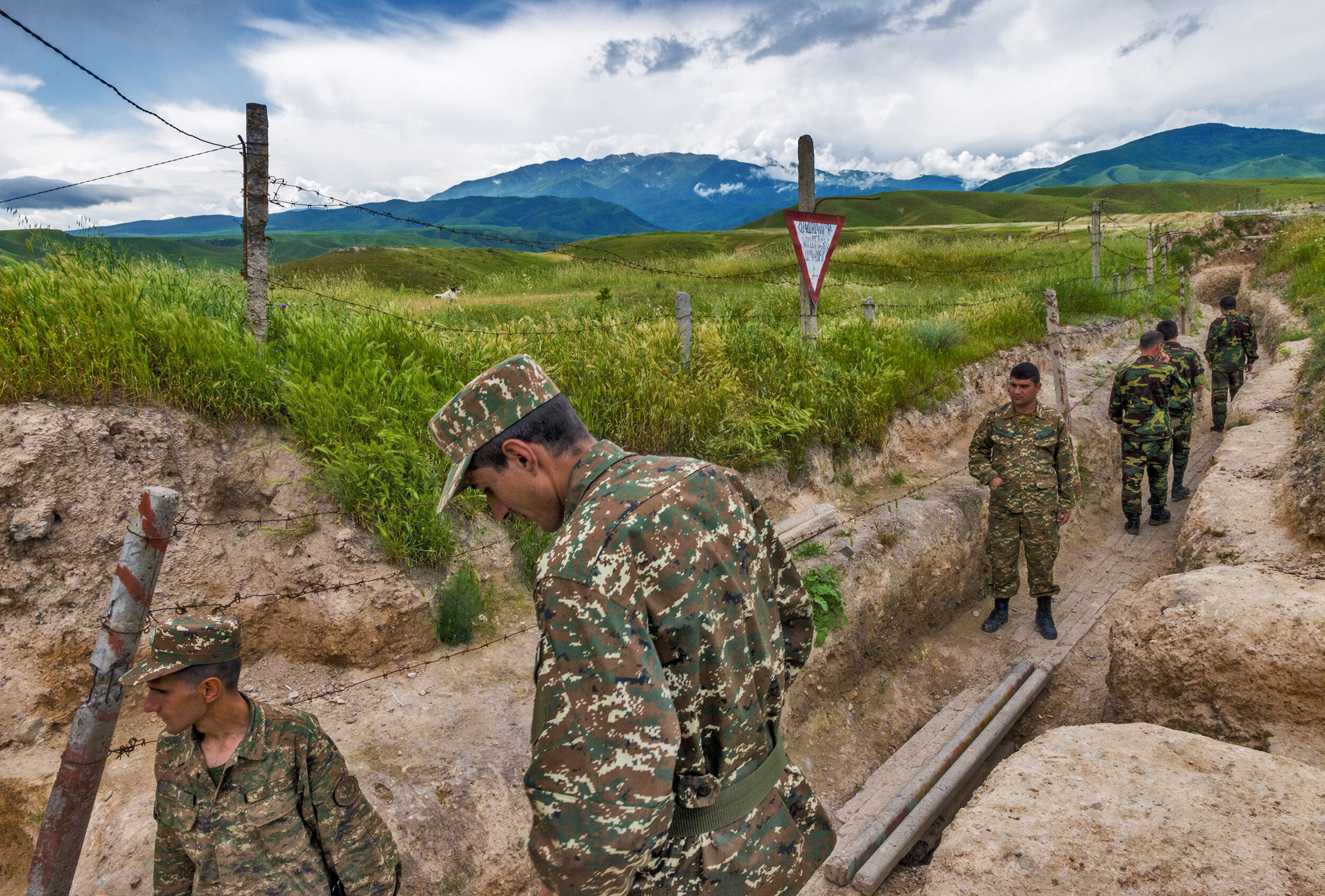  Near the Murovdag mountain range, NKR soldiers thread through slit trenches on the Line of Contact in Nagorno-Karabakh.  The decades old, World War I-style trench system wound along the NKR-Azerbaijan border for over 100 miles. 