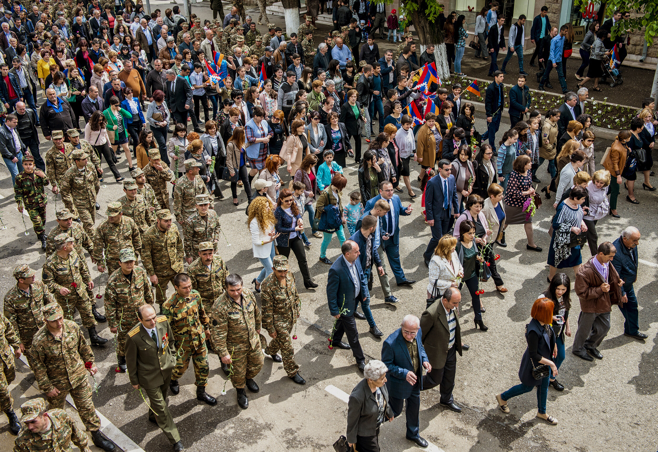  Civilians and military personnel parade through Stepanakert, Nagorno-Karabakh on May 9, 2016. The usual columns of tanks were absent.  Called Yeraton, the holiday commemorates three events:  On May 9, 1992, Armenian forces captured the strategic mou