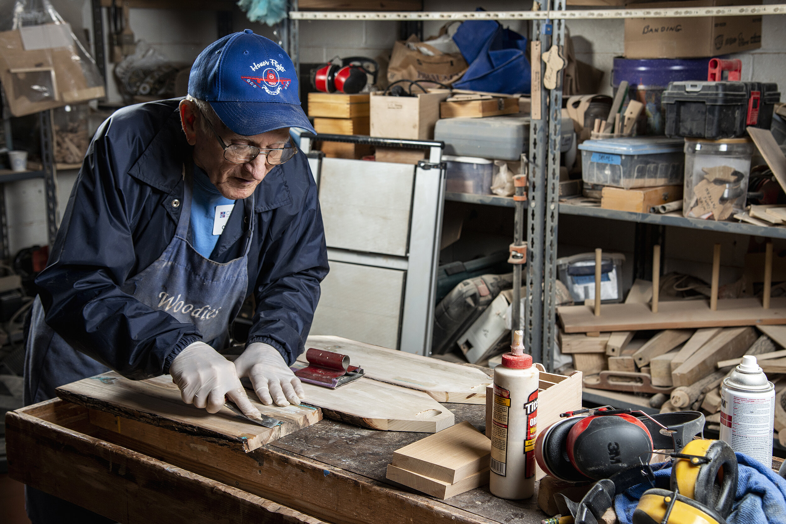  Fred Christen works in the woodshop at CC Young Senior Living center in Dallas, TX.  Christen, a frugal 89-year-old, helped organize the Woodies, a collective of senior woodworkers who, in addition to making hand-crafted goods, repaired residents’ f
