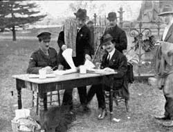 Sgt Foster and helpers allocating trees (Weekly Courier July 1918).