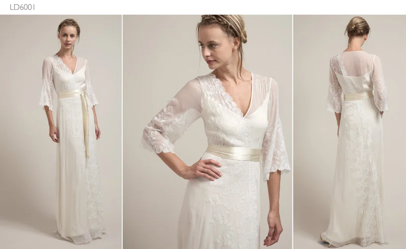 A woman posing in a wedding gown