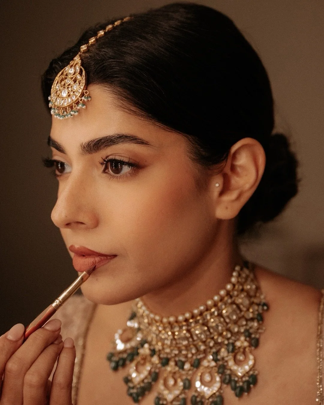 She arrived, exactly as she intended.
Measured, refined, entirely self-styled.
He met the moment differently&mdash;
with feeling he couldn&rsquo;t quite hold back.

Geetika and Pranav

Make up by the Bride herself @geetika.chakravarti 
Groom @nonzz19