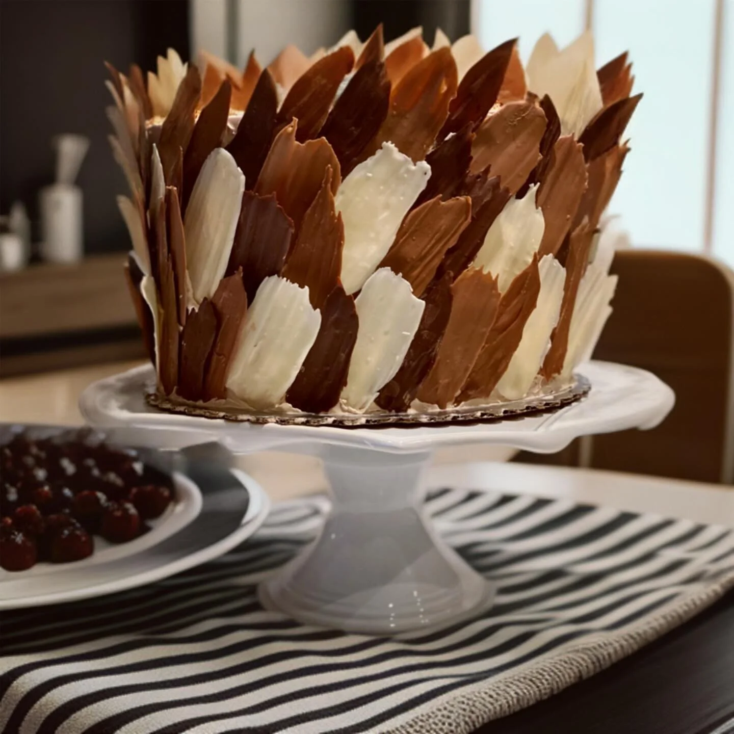Cakes are great because they&rsquo;re a year round treat! This cake was a fun one where I was able to flex my creativity and love for chocolate by decorating the entire cake with chocolate feathers! This is a chocolate cake, salted caramel buttercrea