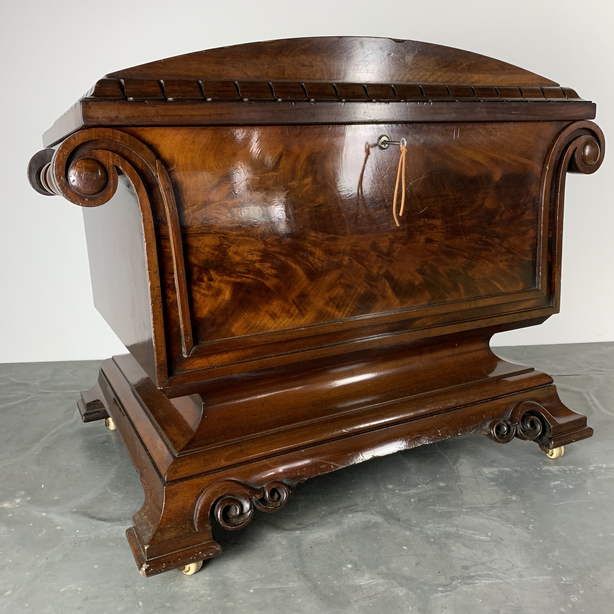 Antique flame mahogany sarcophagus wine cooler