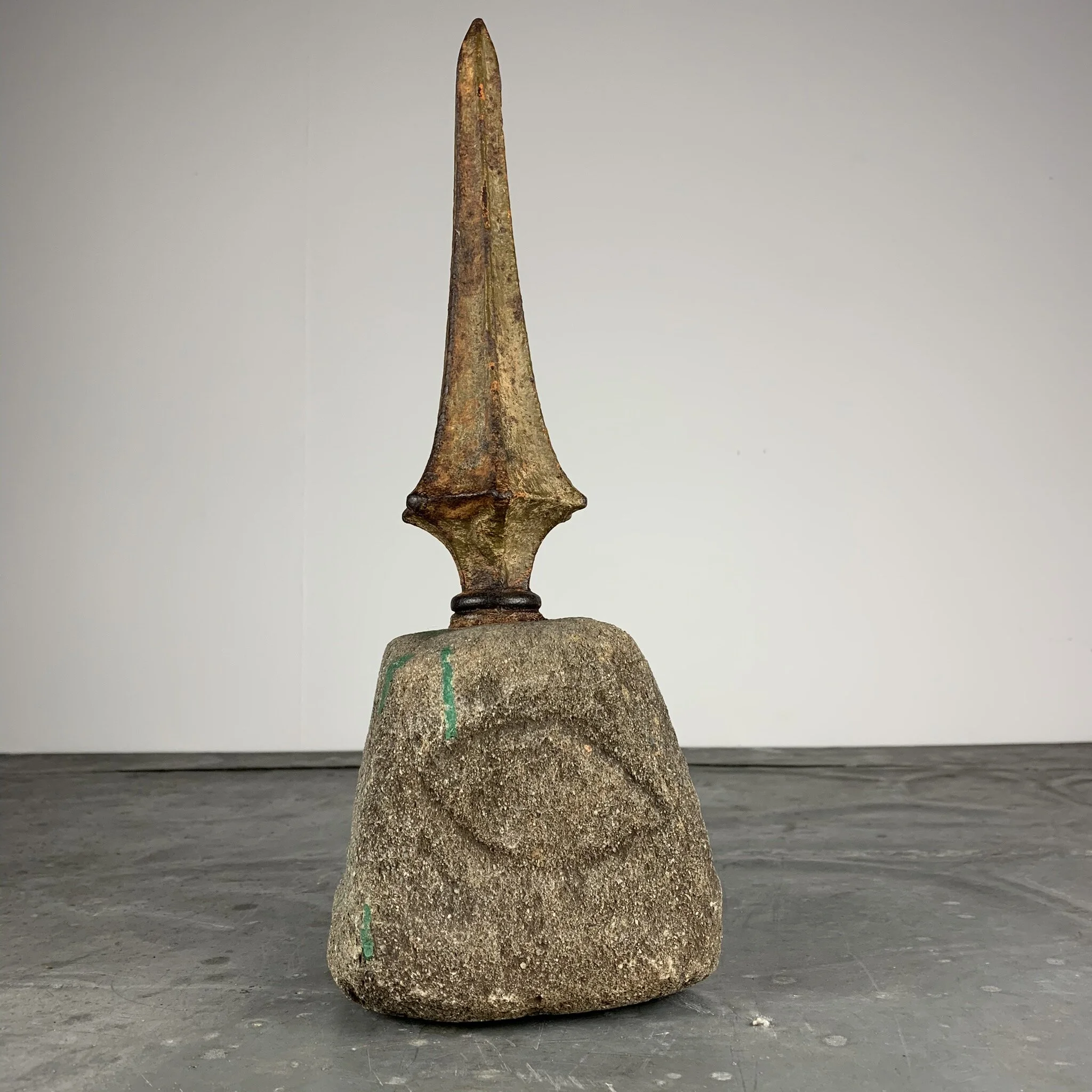 carved stone depicting fish and bird