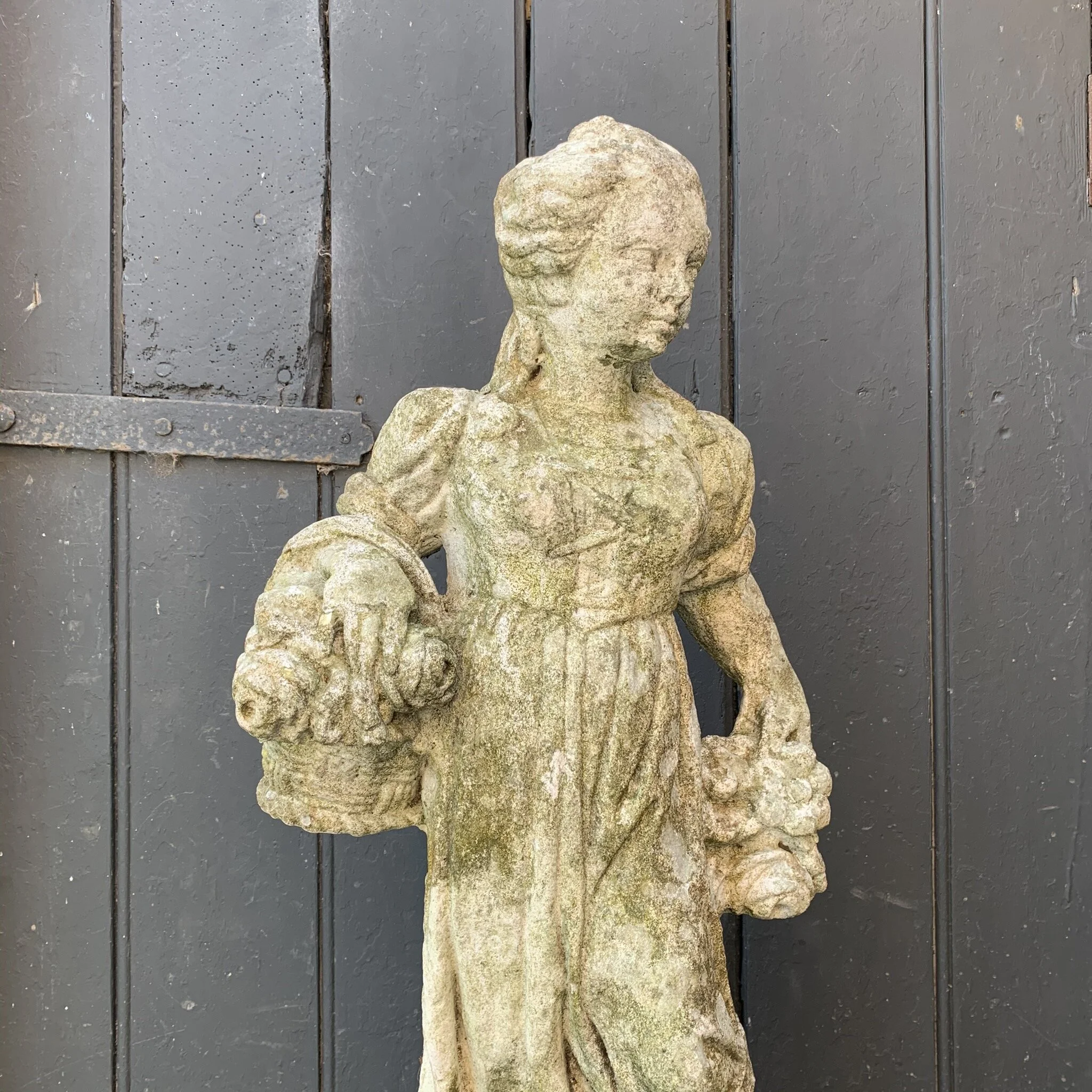 garden statue of the flower seller