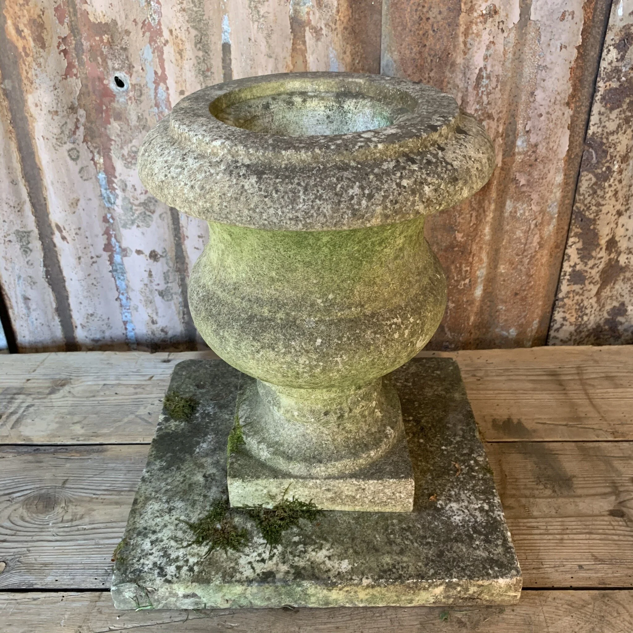 well weathered marble garden urn