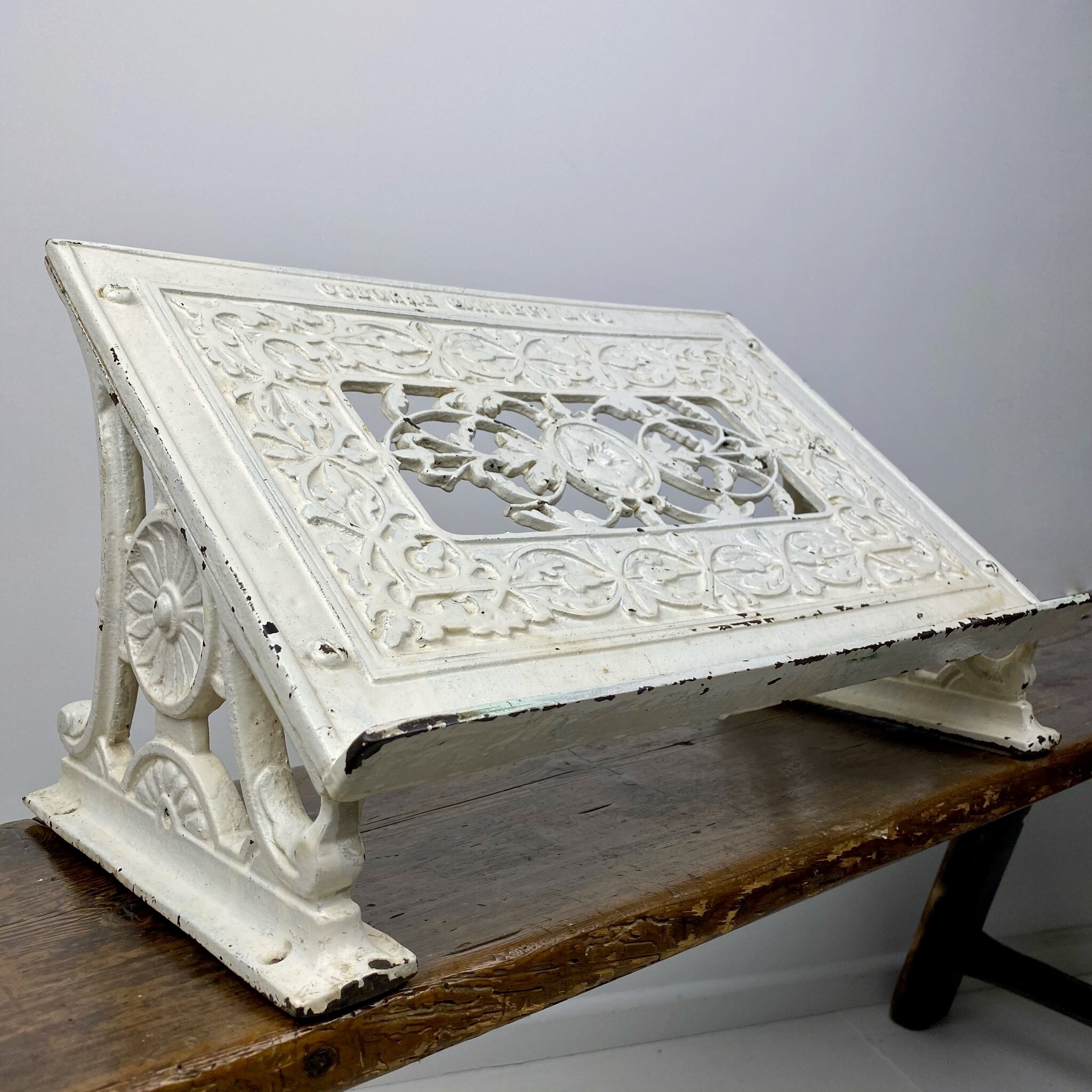 Osborne Garrett and Co cast Iron Book stand