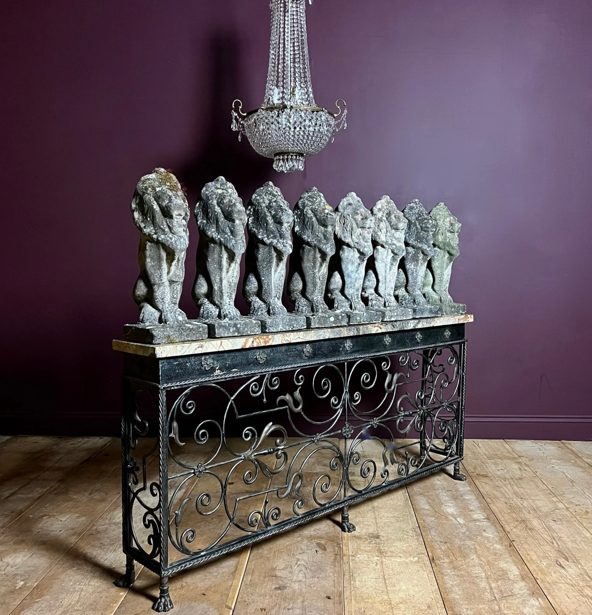 Fine set of eight reconstituted stone seated lions