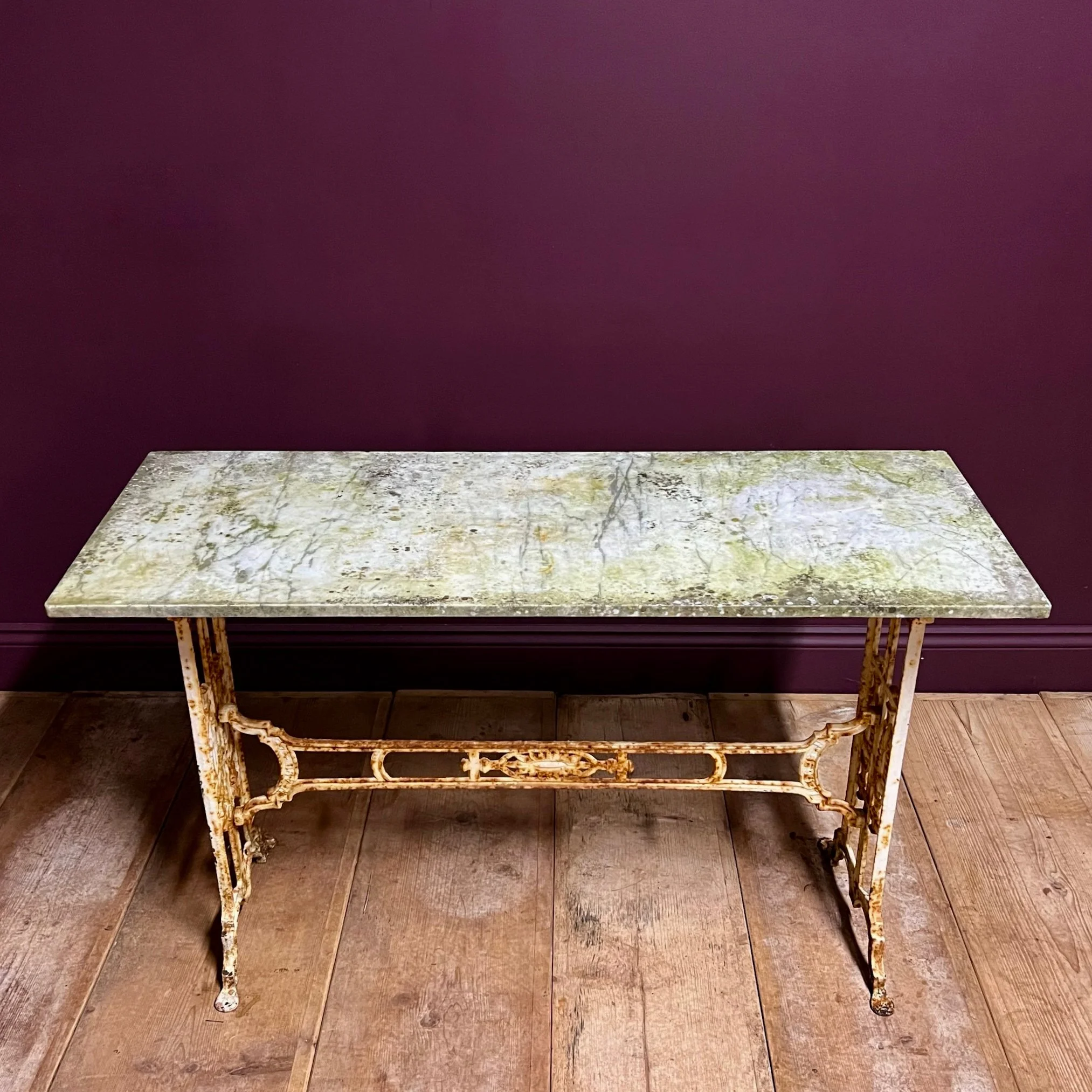Marble topped console table and original cast iron base