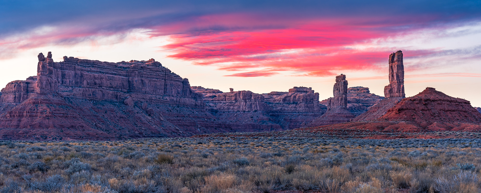 a cotton candy sunset over valley of the gods in bears ears national monument