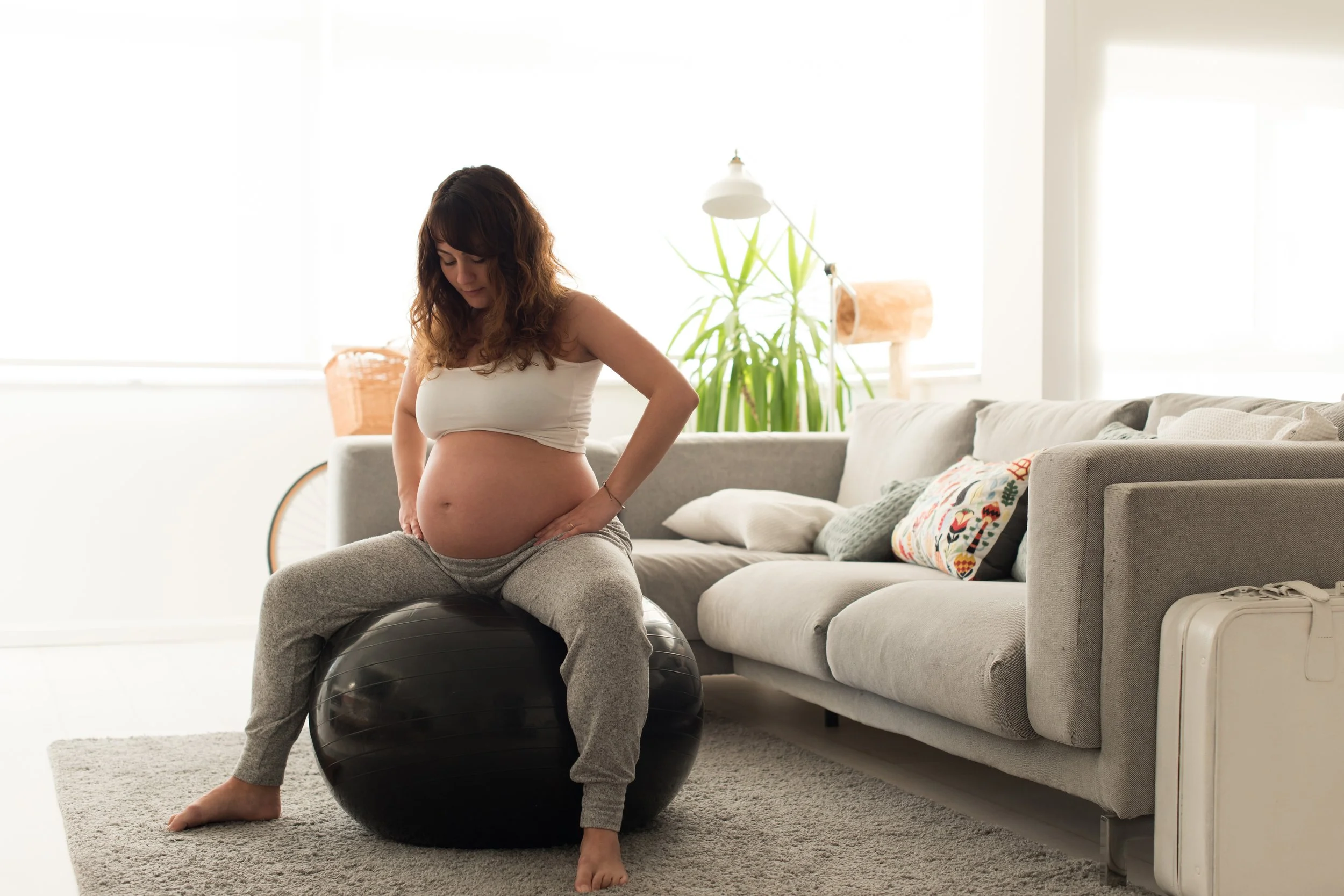 pregnant-woman-doing-relax-exercises-with-a-fitbal-2023-11-27-05-36-22-utc.jpg