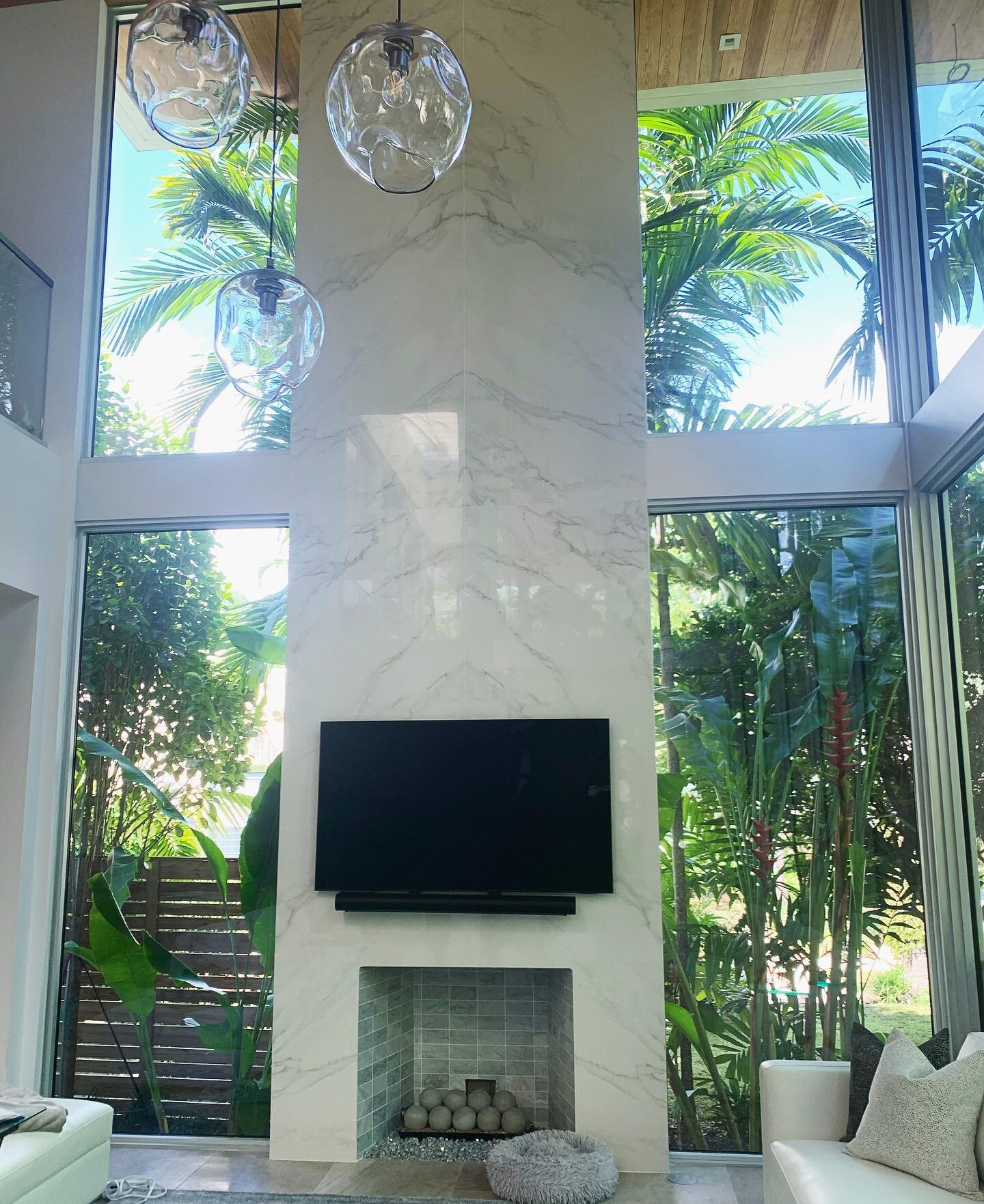 Custom made Fireplace in Italian Porcelain  #jungalowstyle #housetour #currentdesignsituation #finditstyleit #homerenovation #bathroomdesign #dreambathroom #bookmatchedslabs #bookmatch #fireplace #fireplacedecor #centerpieces #homedecor #miamivice #s