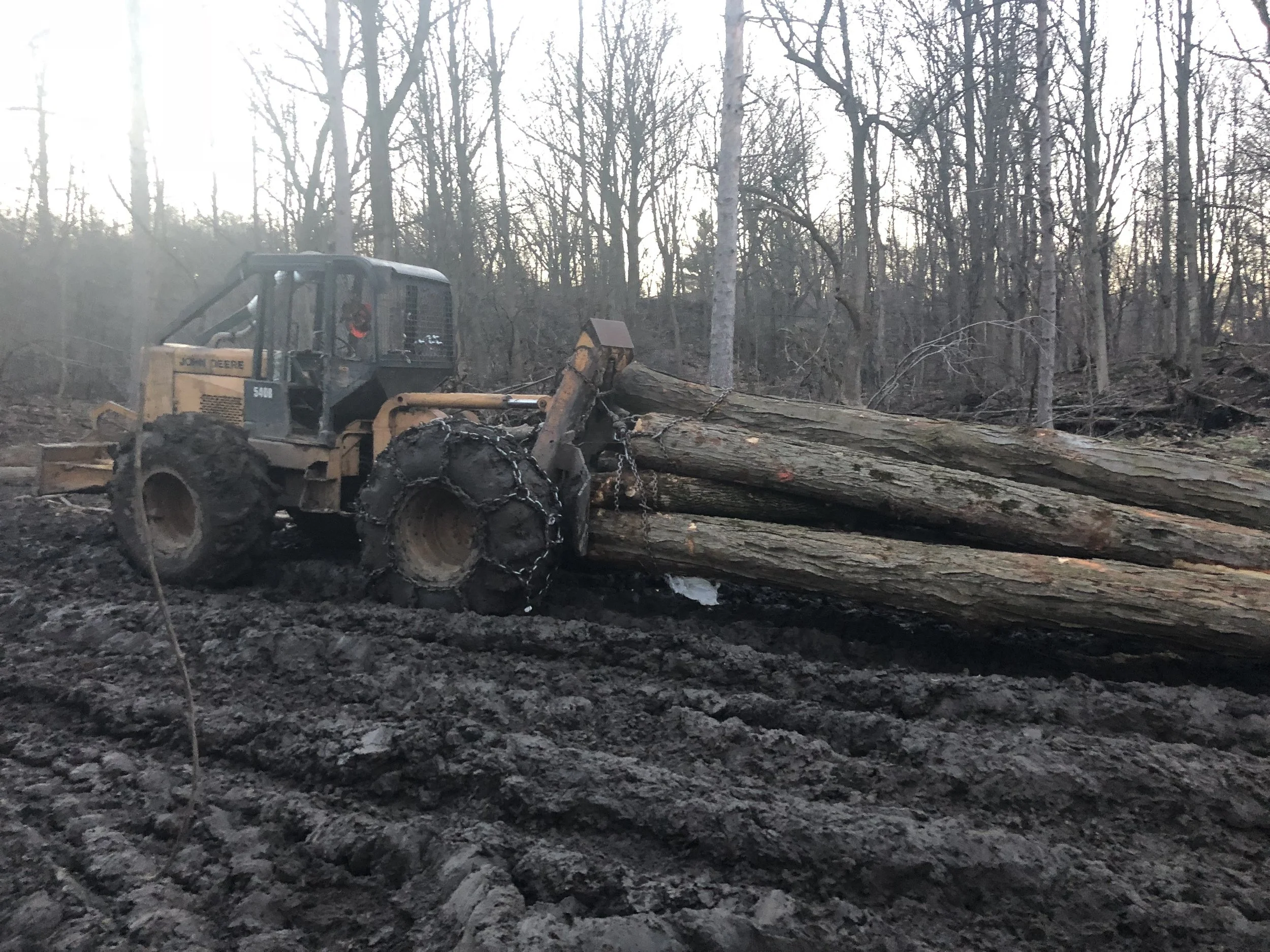 Pulling a hitch of hardwood out of the woods
