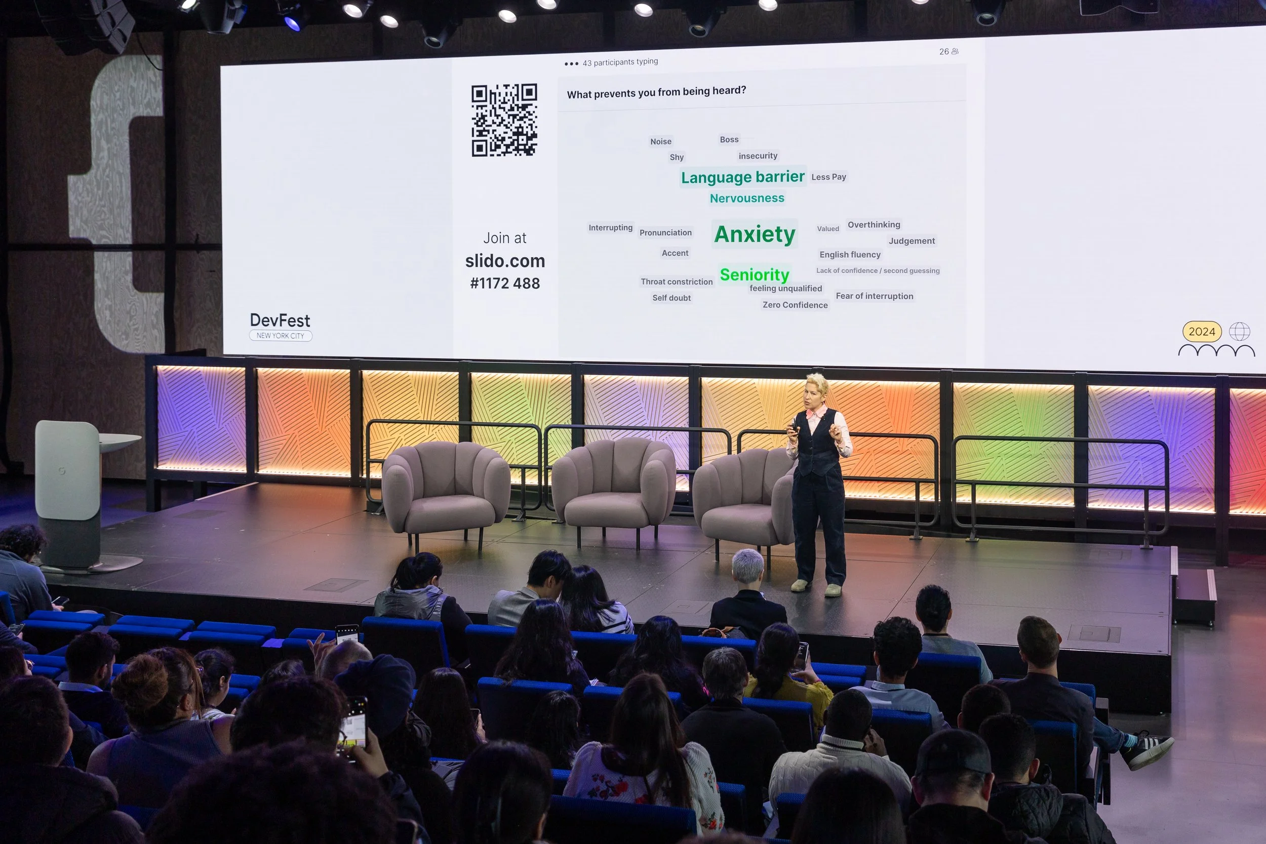 Communication coach Lee Bonvissuto speaking on stage