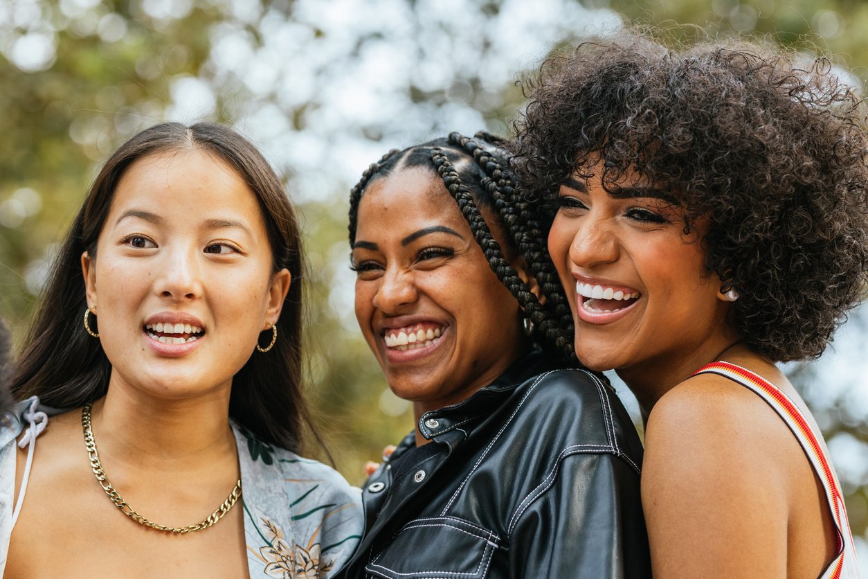 Three women standing together — Soft Power Women's Group therapy for women in Houston TX and across Texas via telehealth