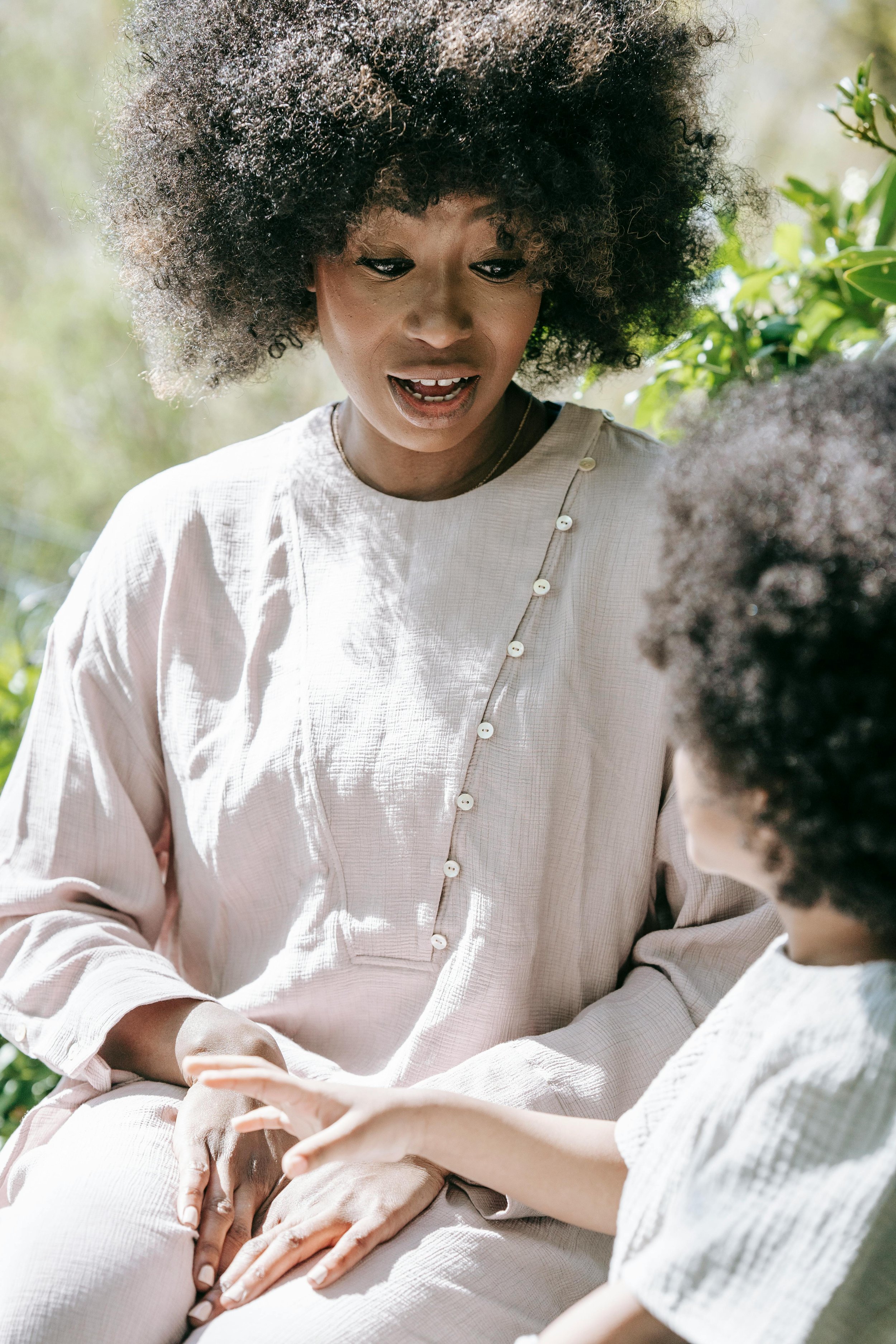 Black child with natural afro outdoors — parenting therapy for generational cycle-breakers in Houston TX