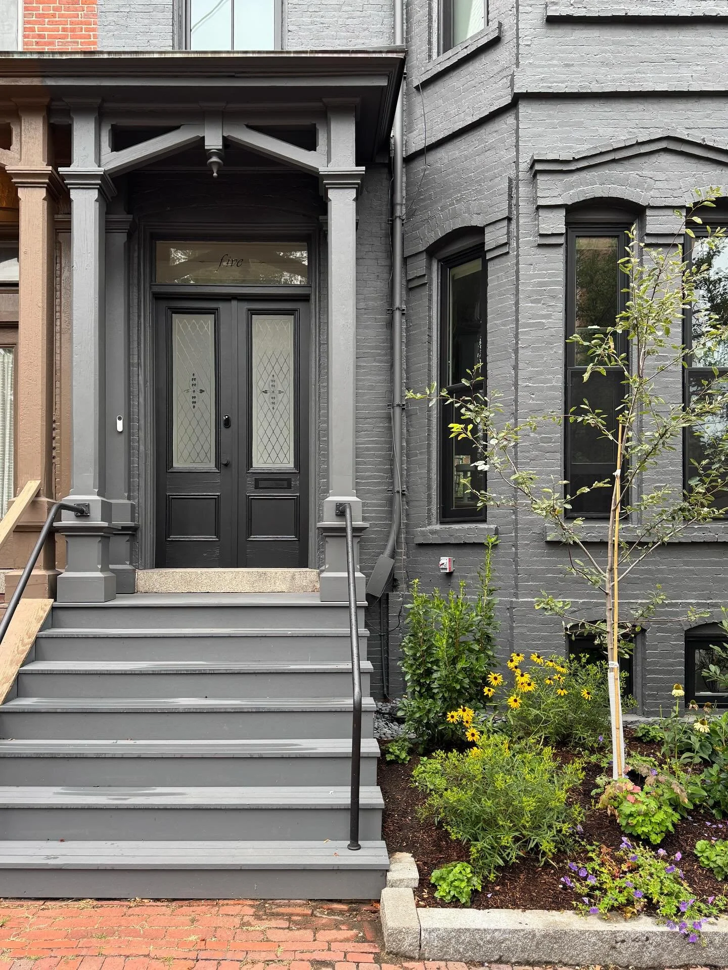 We repainted the house the same paint color (Benjamin Moore Gray, if you're wondering). But we changed the doors to black and I love it. 🖤