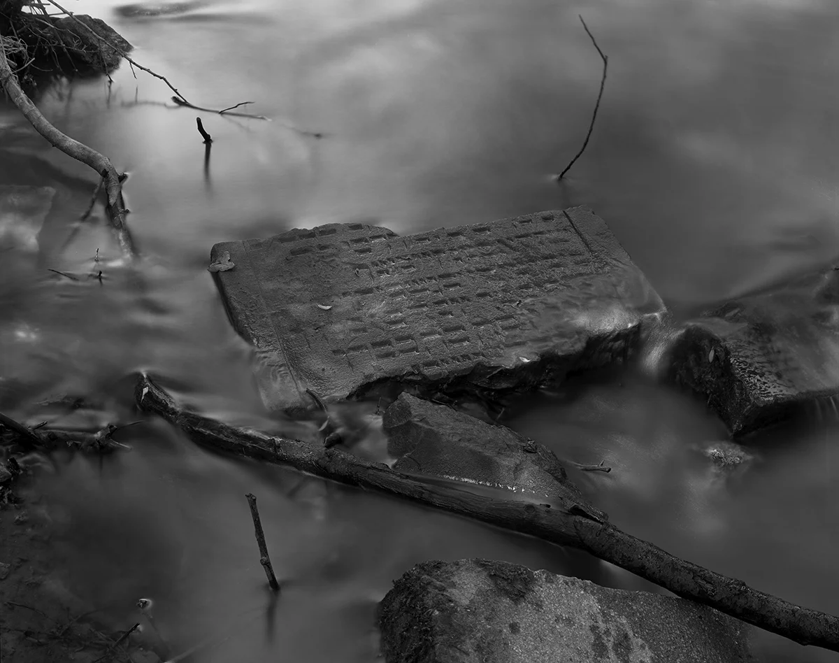 Broken Jewish Headstone in Stream (Holocaust) 1979 Florsheim am Main, Germany