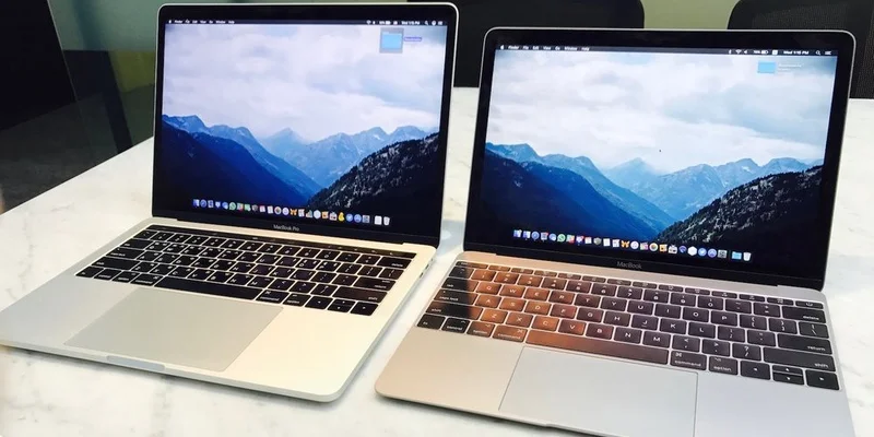 12-inch MacBook (2017) alongside the 13-inch MacBook Pro with Touch Bar.