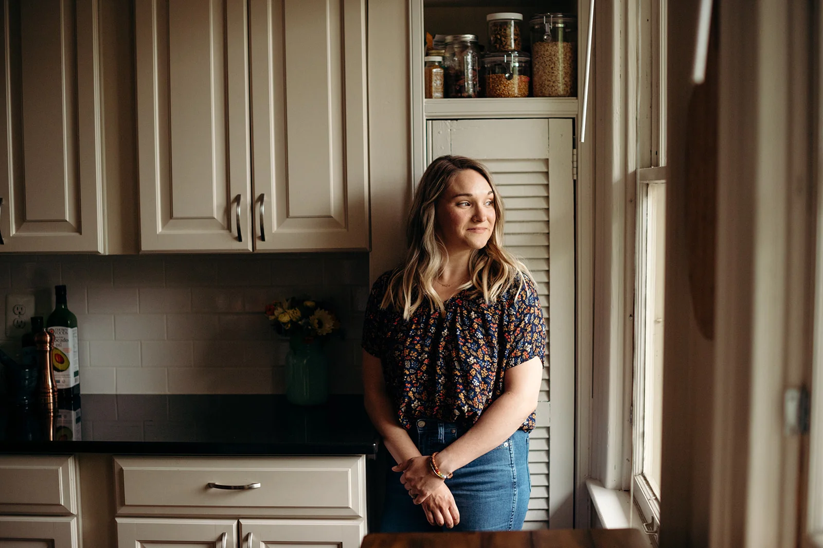 Sarah gazing out her kitchen window | whole30 recap.jpg
