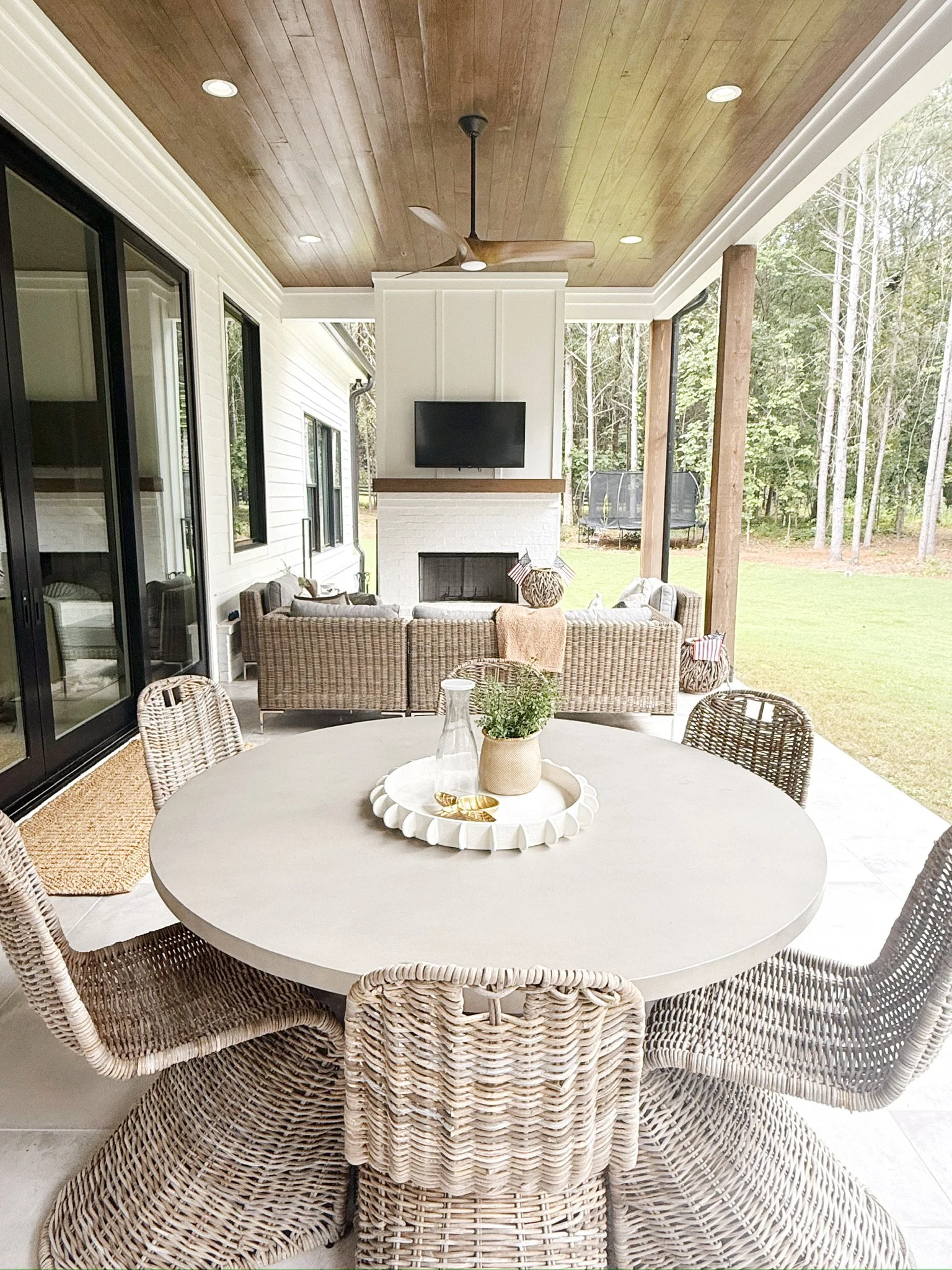 emily-porch-table-fireplace.JPG
