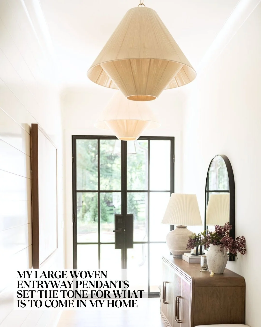 bright natural light entry way with large pendants