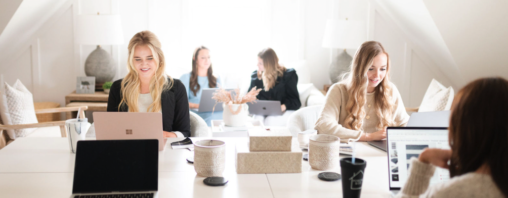 Porche and Co. design team in the design studio working on client homes