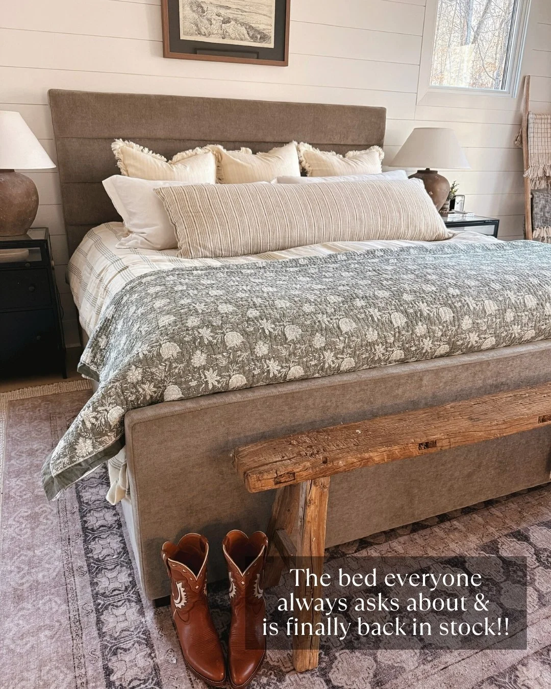 Primary bed styled with texture of blankets and pillows with a brown bench