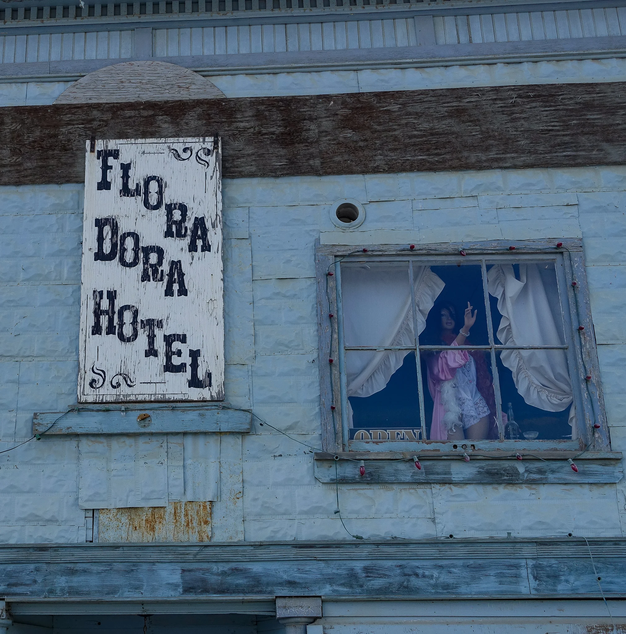 IN THE MID-30S, THE FLORA DORA HOTEL WAS THE PROPERTY OF MADAME RUBY SCOTT. THE PRICES FOR “LIBERTY” OR “CECILE” WERE $5 A TIME OR $20 FOR THE NIGHT. A DREDGERMAN EARNED $5 FOR A 12 HOUR SHIFT.
