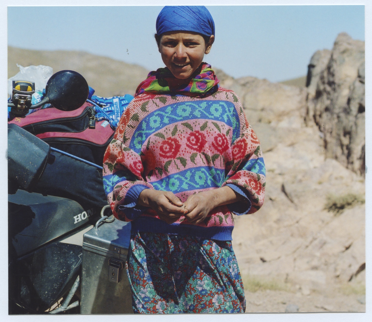 A BERBER GIRL SELLING ROCKS NEAR TIOUIT. I’D BEEN BOUNCING OVER THEM ALL DAY LONG. IT WAS A HARD SELL.