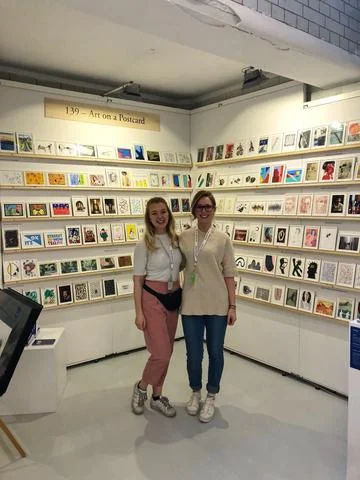The Art on a Postcard girls Kiera and Rihanna ready for day two of the fair