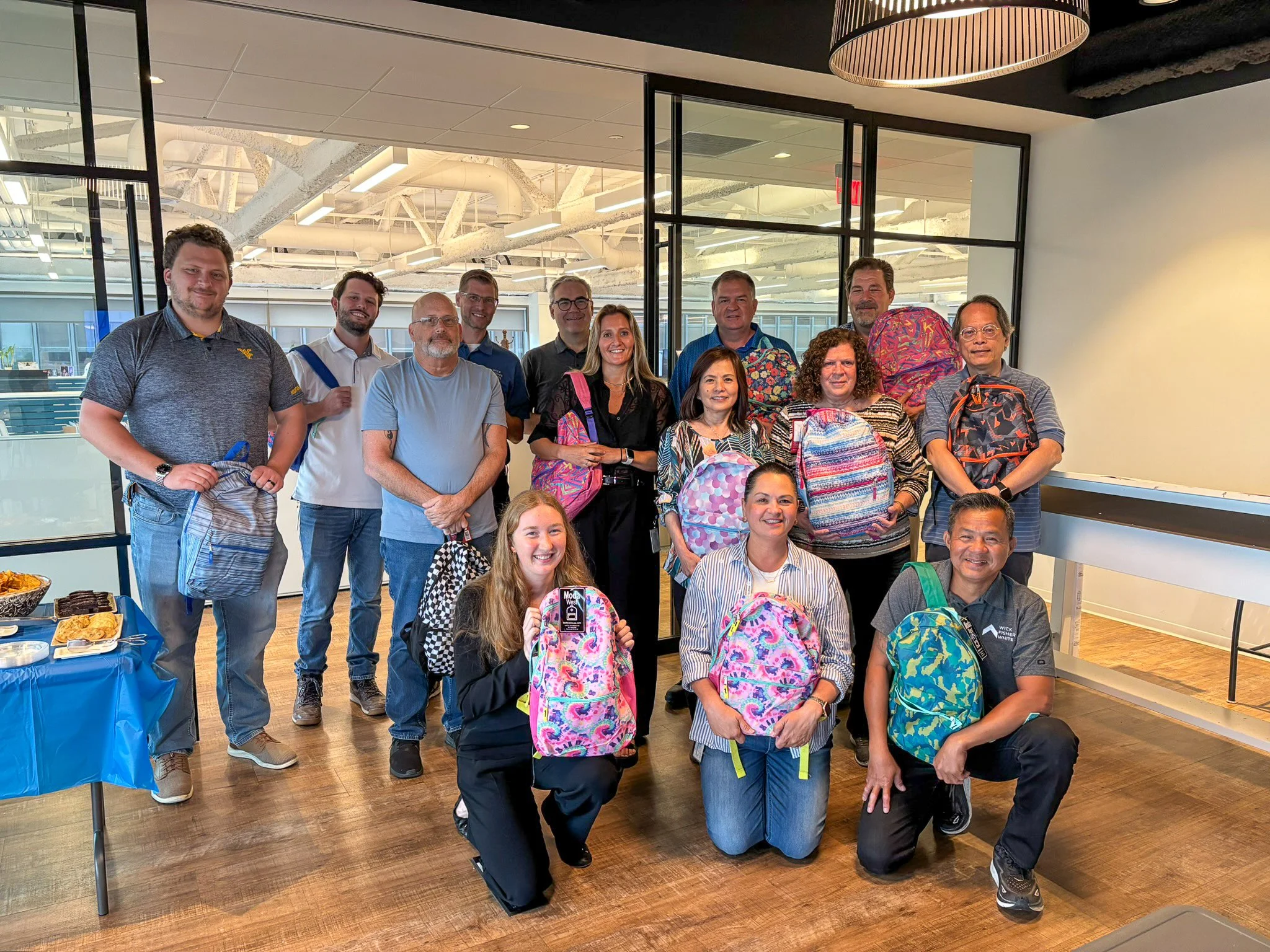 Wick Fisher White Hosts Backpack Drive to Support The Salvation Army