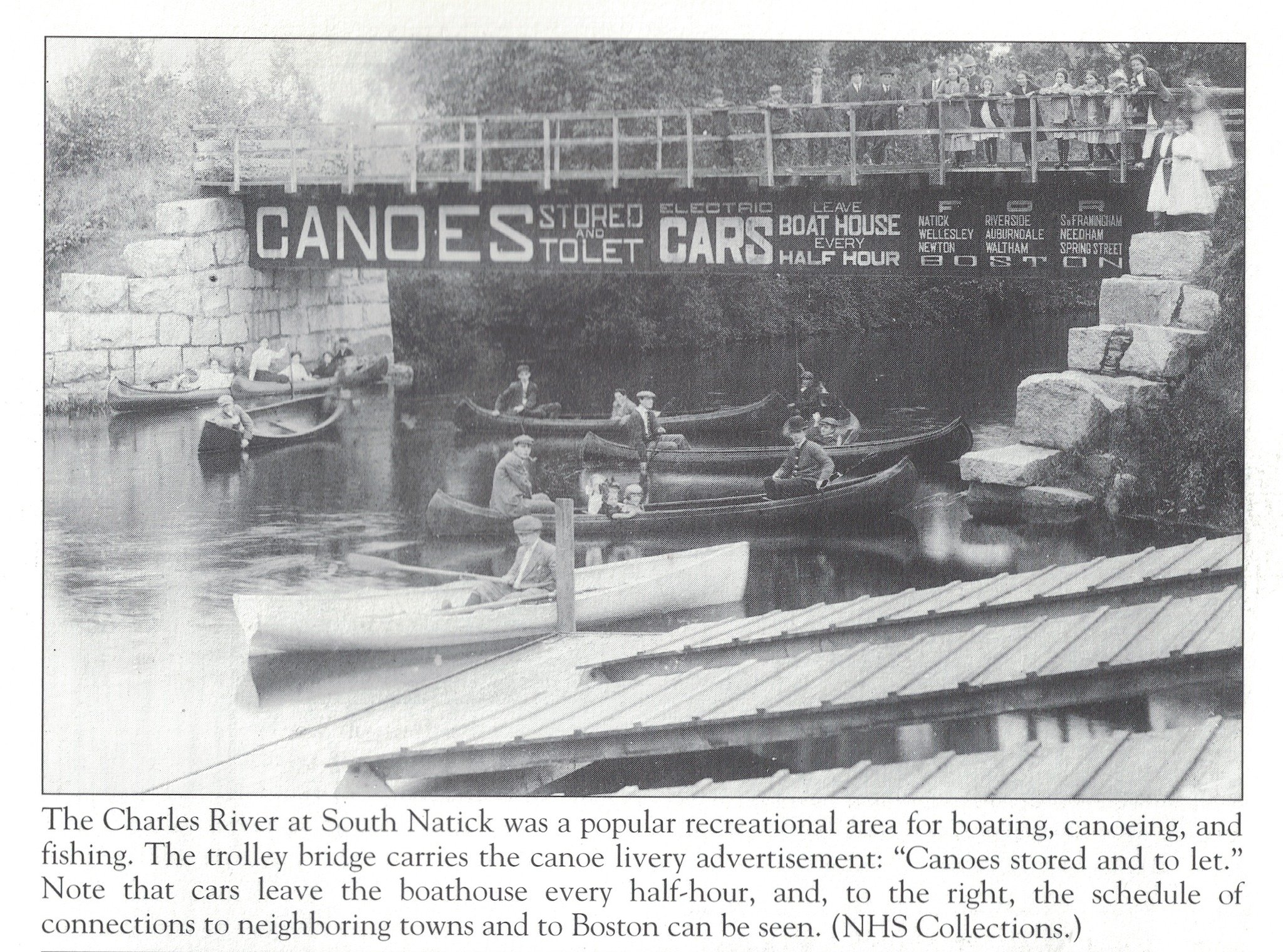 This image from the Natick Images of America series shows a canoe livery advertising on the electric trolley bridge. If you are interested in exploring our trove of Natick's historical treasures, please visit our website at https://www.natickhistoric