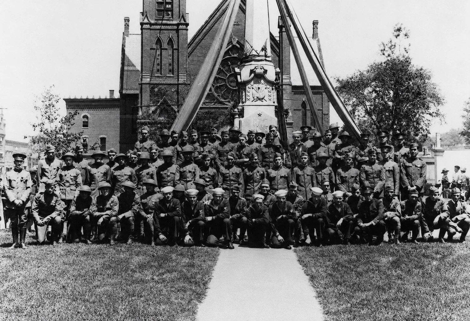 This Memorial Day, we pause to remember the Natick men and women who served, and especially those who never came home.

This photograph shows World War I-era servicemen and sailors gathered on Natick Common, posed before the Soldiers&rsquo; Monument.
