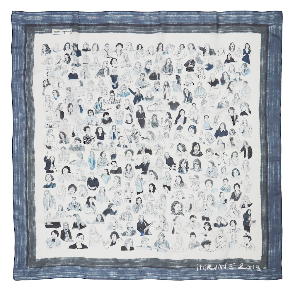 A fabric artwork featuring numerous hand-drawn portraits of diverse women, arranged in a grid, with a dark border and a small label in the top left corner that reads 'RESISTANCE BY DESIGN'. The artist's signature and the date 'HERWAVE 2018' are in the bottom right corner.